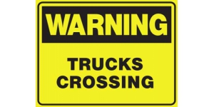 WARNING TRUCKS CROSSING